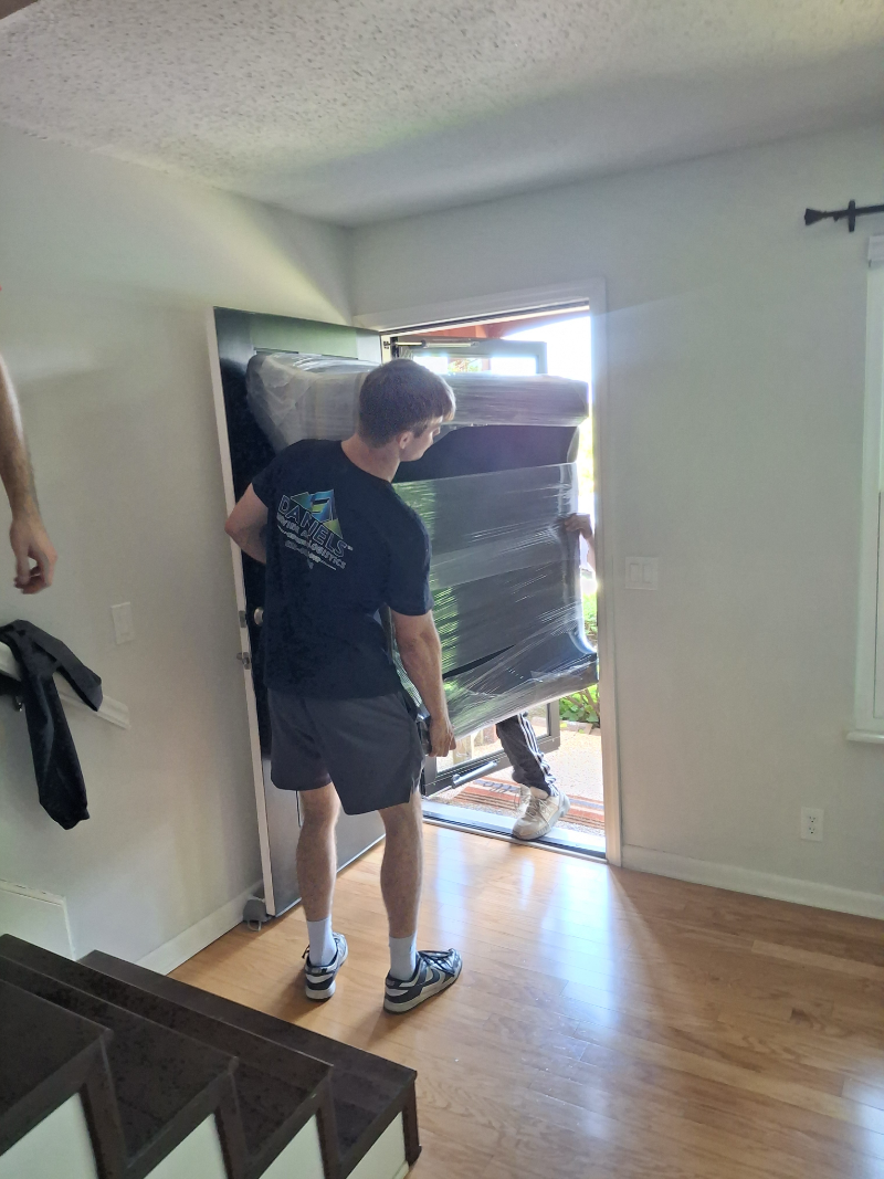 The Physics of Moving Heavy Solid-Wood Furniture and Complex Multi-Piece Storage Systems